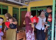 Dukung Program MBG, Serda Mashuri Dampingi Penyaluran Makanan Bergizi untuk Balita dan Ibu Hamil