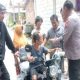 Penyandang Disabilitas Asal Kedungpring Terima Bantuan Sepeda Listrik Dari Ipda Purnomo